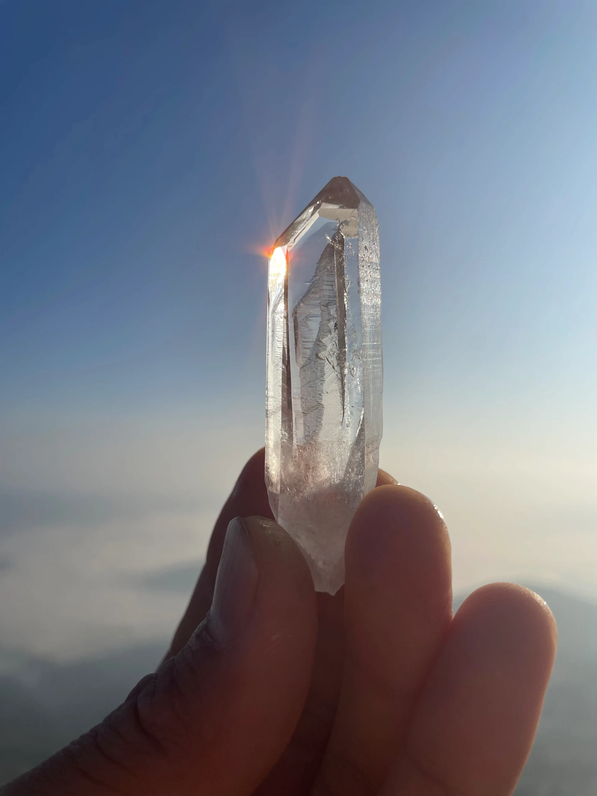 Sunlight catching the tip of a crystal